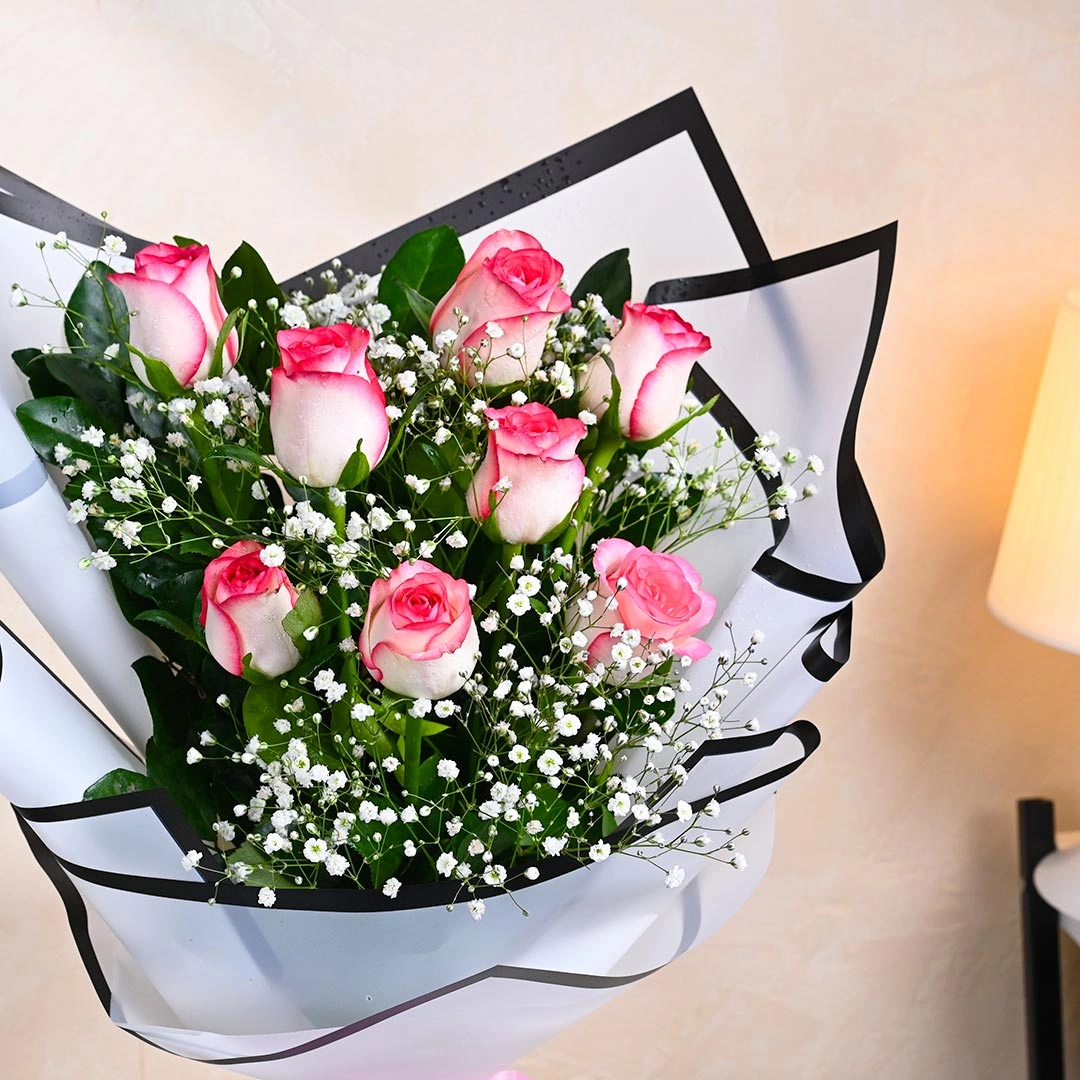 glowandblushpinkroseswithbabybreathc 1