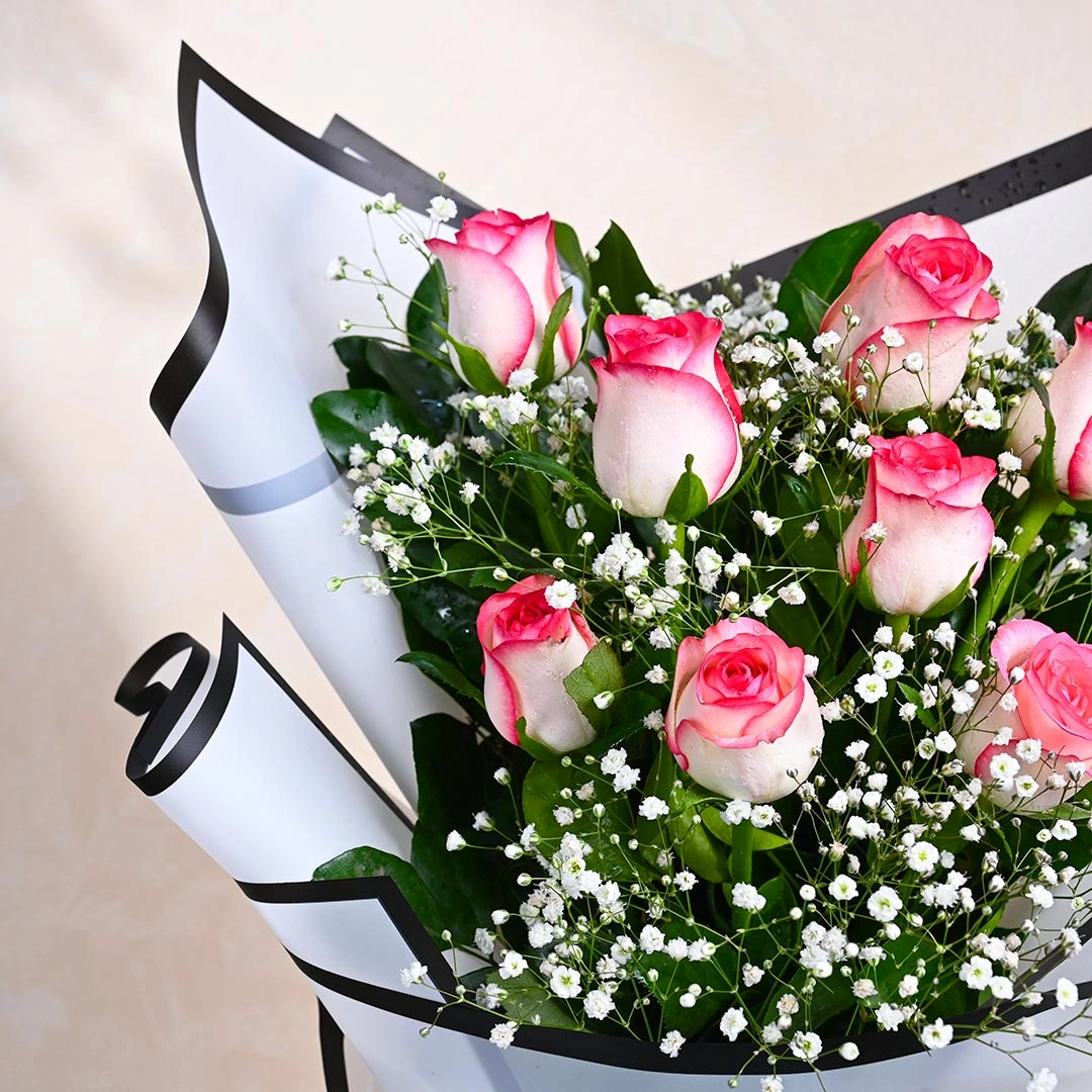 glowandblushpinkroseswithbabybreathd 1